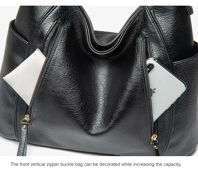 Beth Cross Body with tasseled front zippers