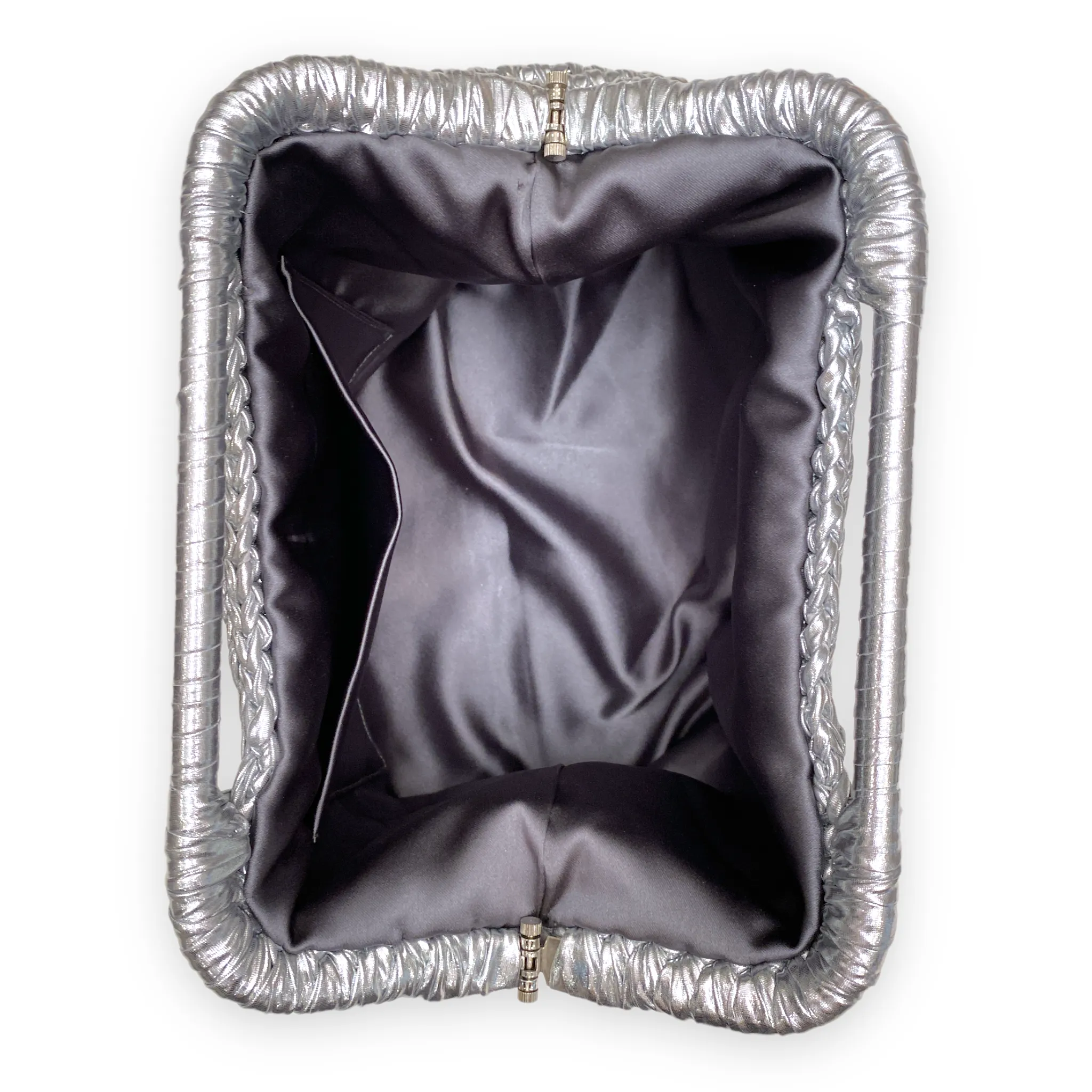 THE METALLIC CLUTCH